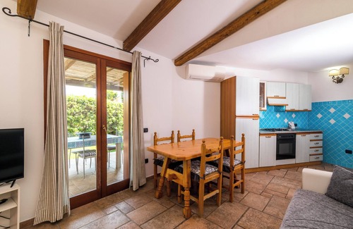 Porto San Paolo House | Holiday Home "Villa Teresa" with Shared Pool, Private Terrace & Air Conditioning