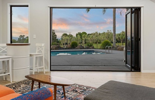 Clarks Beach House | Holiday Home I Heated Pool