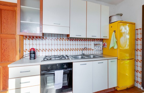 S'Archittu House | Holiday Home 'Villa Due Archi' with Sea View, Private Terrace and Private Garden