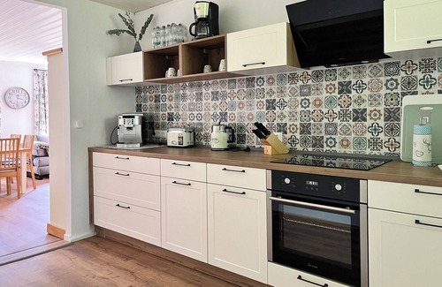 Briesensee House | Holiday Home 'Waldhaus Am See' with Private Terrace, Private Garden and Wi-Fi