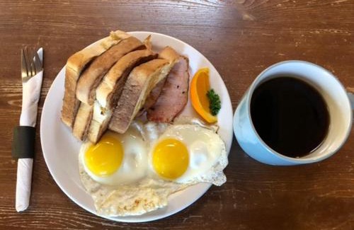 Heritage Downtown Hotel | Holiday House Motel