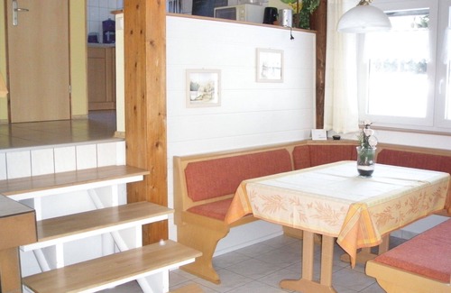 Feriendorf Silbersee House | Holiday house on Silbersee with south-facing terrace, balcony and forest view