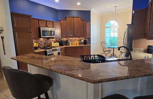 Charlotte House | Home in The Villages with His & Her Golf Carts through 2025!