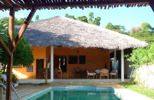 Nosy Be House | Homerez - Bungalow for 4 ppl. with shared pool, sea view and garden at Andilana