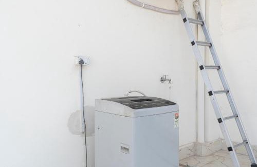 Dariyaganj Apartment | Homlee-Value 1 BR-Central Delhi-terrace-view-lift