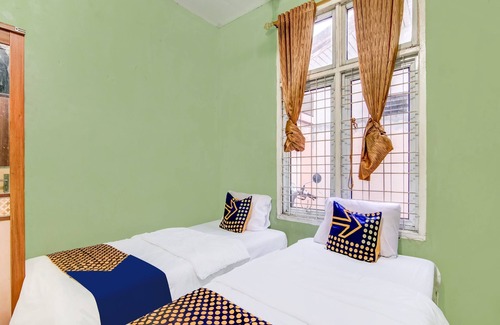 Pekanbaru Hotel | Hotel O Nayla Homestay Syariah Near Koro Koro Panam, Karaoke, Pool, & Cafe