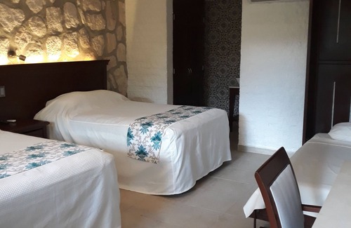 Piste Hotel | HOTEL PUERTA CHICHEN