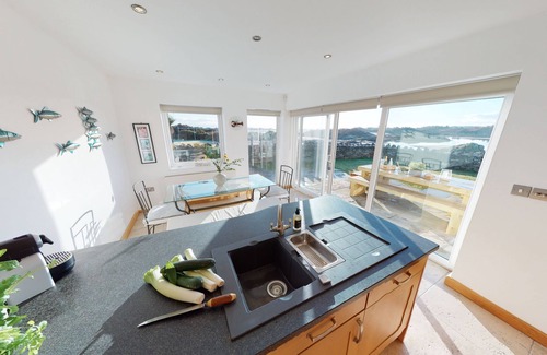 Caergeiliog Cottage | House on the Beach - an on the beach that sleeps 9 guests in 4 bedrooms