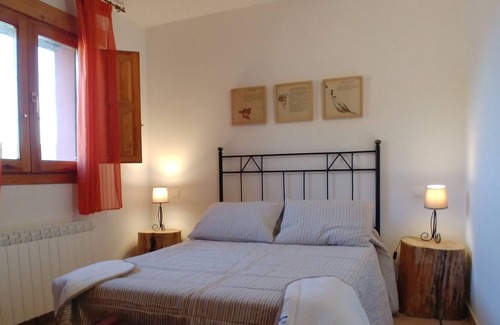 Una Cottage | House the Escalerón I | La Laguna Accommodation. Patio, barbecue and fireplace.