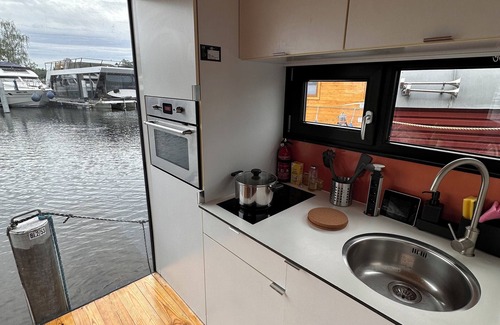 Schmoeckwitz Boat Rental | Houseboat with sauna & fireplace - pure relaxation on the water surrounded by nature