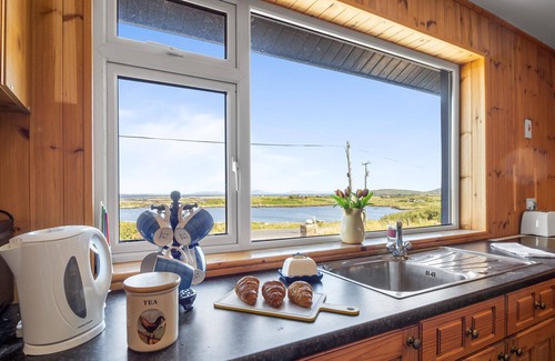 Claddaghduff Ski Chalet | Hughs Cottage Sea Lake Views to Steal Your Heart