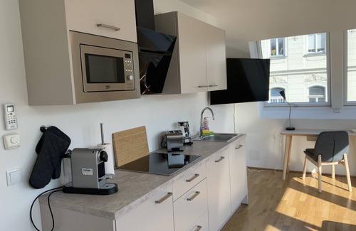 Weißgerber Apartment | Im Pyjama zum Hundertwasserhaus Hüpfen | HG25