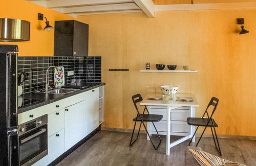 Mirandol-Bourgnounac House | In idyllic location of a forest and near the river Vaur is this cozy wooden house.