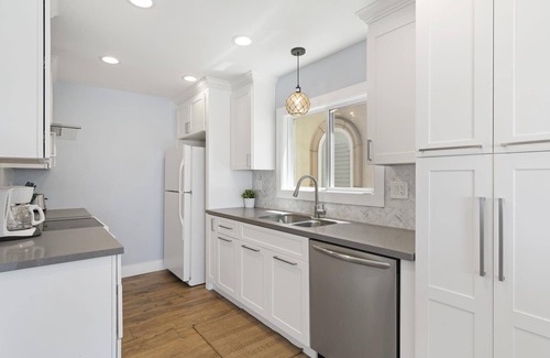 West Newport Condo | Incredible Oceanfront Home | Rooftop Deck | Cool, Coastal Interior!