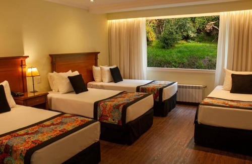 San Carlos de Bariloche Hotel | Inviting Guest Room with Spa Near Nahuel Huapi Lake and Nature Surroundings