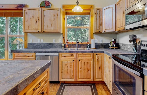 Rivers Crossing Cabin | Inviting home with private balcony, grill, W/D, & great location