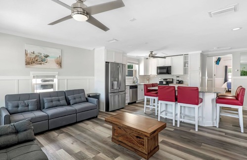 Indian Rocks Beach House | IRB Oasis: 2 homes, Heated Salt Pool, Waterfront, Sleeps 14