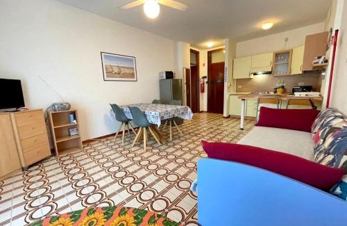 Porto Santa Margherita Apartment | Welcoming flat with pool view balcony