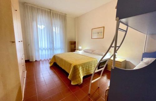 Porto Santa Margherita Apartment | Welcoming flat with pool view balcony