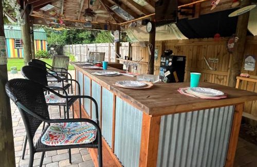 North Northwest Pensacola House | Jan's Oasis Family Retreat Pool Bar Games & Fun