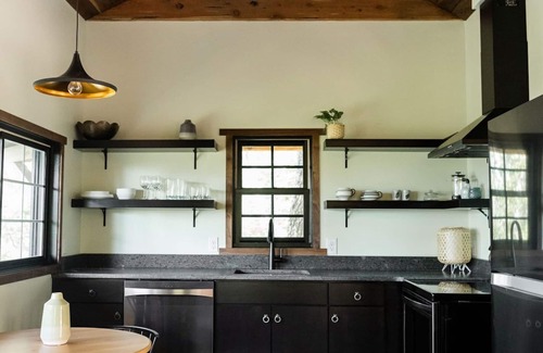 Wildwood House | Japanese timberframe tiny house perched on side of Lookout Mountain