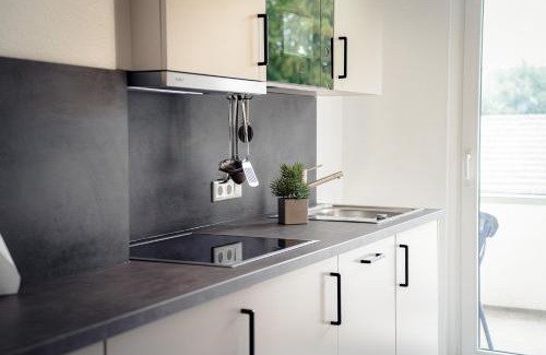 Neudorf-Nord Apartment | JUNIK Apartments "Am Sternbuschweg"