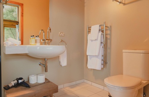 Cape Saunders Resort | Kahu Studio Wake up with a stunning view from the Papanui Inlet