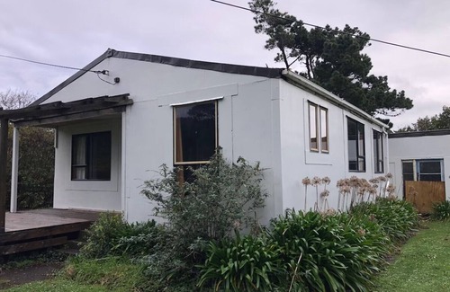 Mokihinui House | Laid back retreat, footsteps to the sand and river mouth, with stunning scenery.