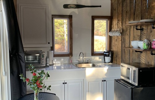 Clare Cabin | Lakefront country cabin with rustic charm overlooking lake