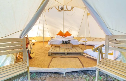 Nunney RV Rental | Lakeside Bell Tent - Canvas Suite at Marston Park
