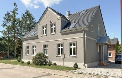 Hintersee Apartment | Landhaus hinter`m See Ferienwohnung Landliebe luxuriöser Wintergarten Kachelöfen