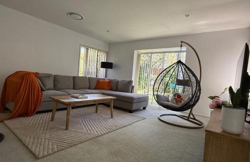 Halswell House | Large warm 4BRM family recharge in Halswell - Netflix, Massage chair