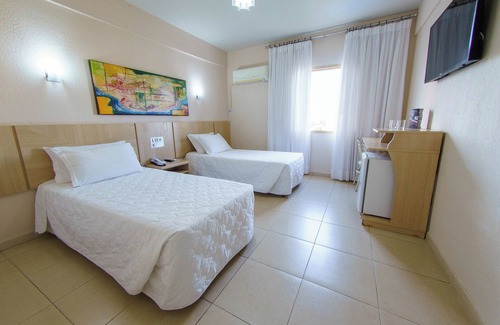 Foz do Iguacu City Centre Hotel | Laugh, Relax & Explore Together in a Large Triple Room by Iguazu Park