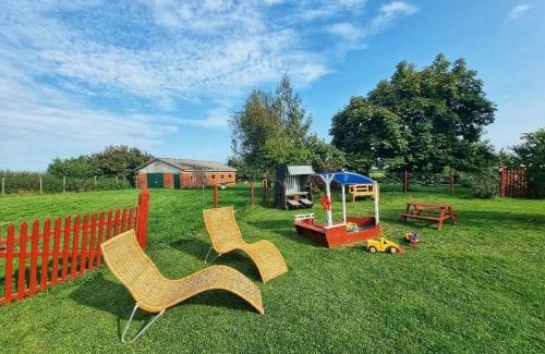 Goldenstedt Apartment | Lichtdurchflutete Dachgeschosswohnung mit Charme