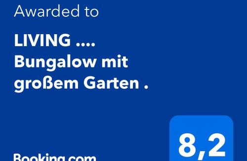 Halver Apartment | LIVING . Bungalow mit großem Garten .
