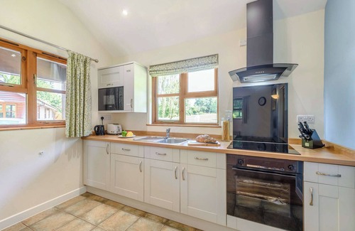Kilcot Ski Chalet | Lodge with one king-size double with en suite shower.