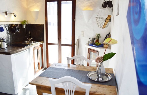 Uga Apartment | Loft-style studio with private, secluded outdoor area in historic finca