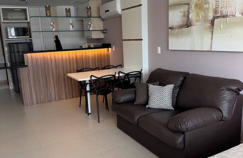 Praia Grande Apartment | Loft with sea view.