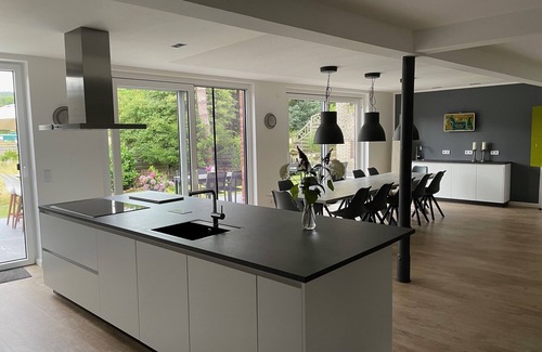 Bad Muender am Deister House | LOFTHOF, modern XXL vacation home for 20 people with billiards, table football, fireplace