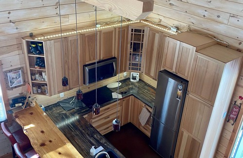 Wentworth Ski Chalet | Log Cabin across from ski Wentworth, with outdoor fire pit and BBQ