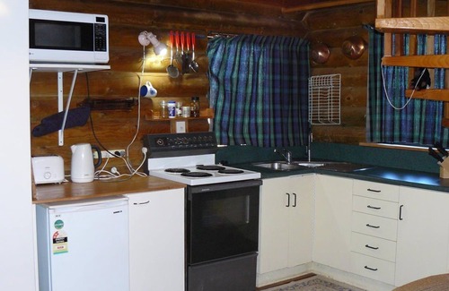 Mt Lyford Cabin | Log cabin in the mountains with indoor climbing wall, perfect for a family.