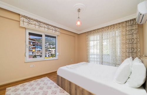 Tosmur Belediyesi Apartment | Lovely Flat with Shared Pools in Alanya