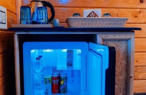 Kukatpally Housing Board Colony Cottage | Lovely Hawk Wooden Cottages - Nature, Comfort, and Jacuzzi Bliss for Two.