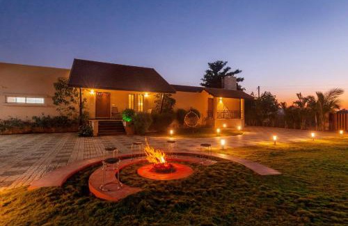 Nashik Villa | Luna Villa by StayVista - Lakeside charm with Terrace, Lush lawn & Modern decor