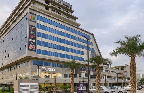 Gurugram Apartment | Lush Comfort Studio with Balcony Views