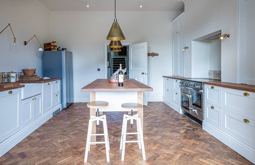 Menai Bridge House | Luxurious Arts and Crafts Home set in 5 Acres of Garden & Woodland onto Straits