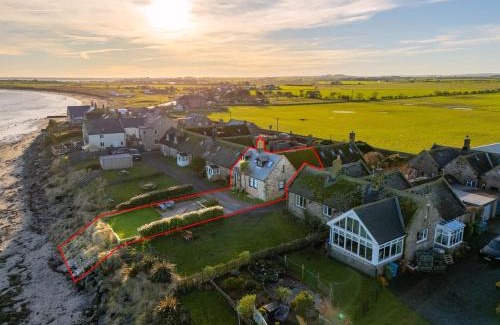 Boulmer House | Luxurious & modern on-the-beach family retreat