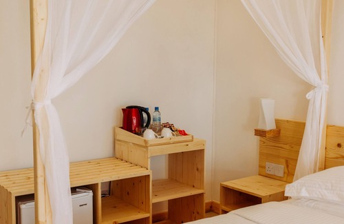 Maradhoo Hotel | Luxurious room with Private Beach Access and Breathtaking Views from Your Bed