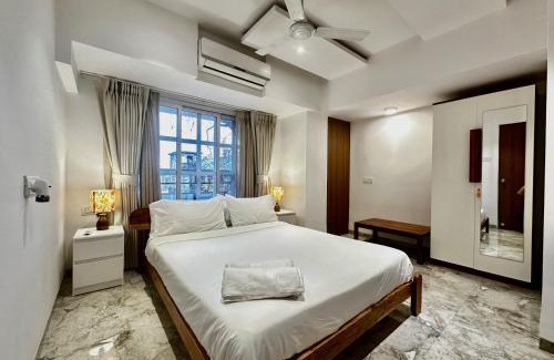 Khar Apartment | Luxury 2 BHK Tropical Apartment with Workspace in Khar West