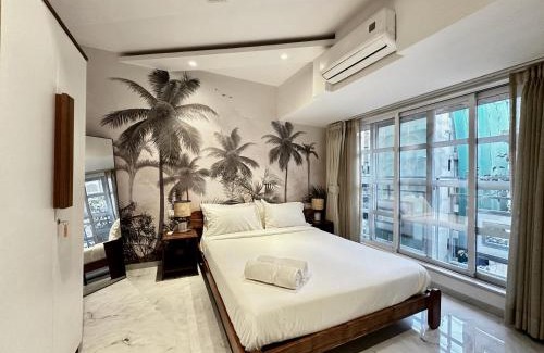 Khar Apartment | Luxury 2 BHK Tropical Apartment with Workspace in Khar West